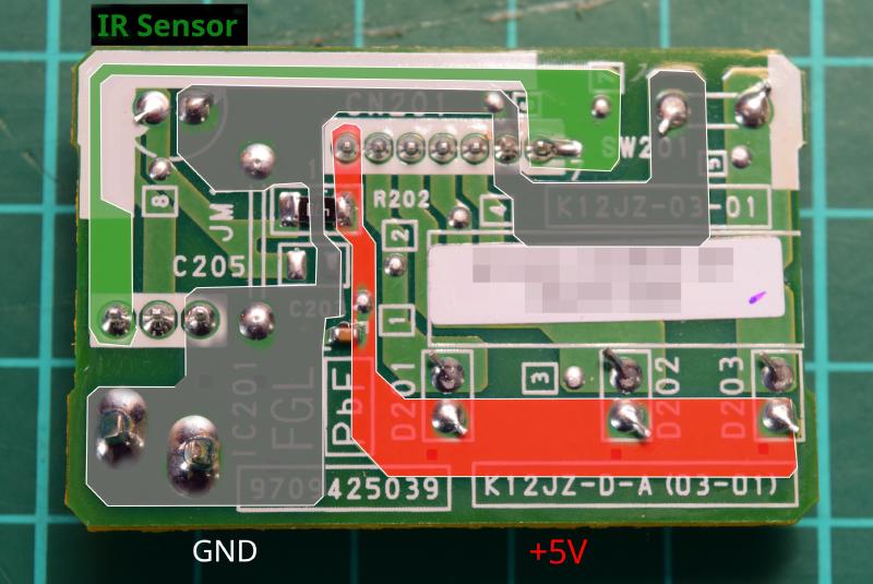 The same photo of the back of the A/C's board, with the relevant nets coloured in and annotated. Slightly under the middle on the left edge is the IR Sensor pin, and the trace leads to the top, and then to the rightmost pin of the connector; it is coloured in green. Ground is mainly in the bottom left with two big solder junctions (the case of the infrared sensor). The filled coloured area touches several pins on the board, including teh rightmost one of the infrared sensor and the 2nd pin from the right on the connector at the top. It is colored grey and marked GND. +5V covers the bottom right three pins, which are the anode pins of the LEDS. The filled area reaches to the leftmost pin of the connector on the top, also connecting to the surface mount capacitor and the 470 ohm resistor on the way there.