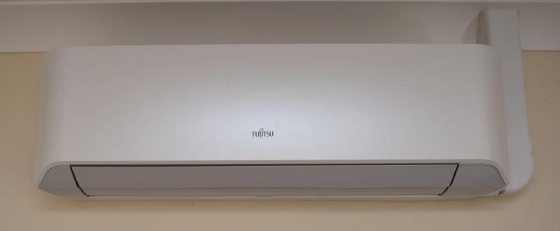 A normal, closed up air conditioning unit, after it's all put together again