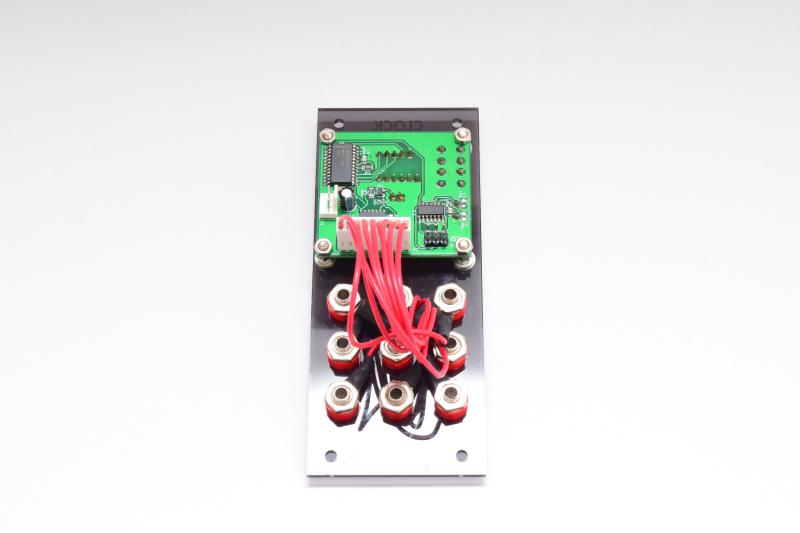 Rear view of the clock generator module, showing the circuit board